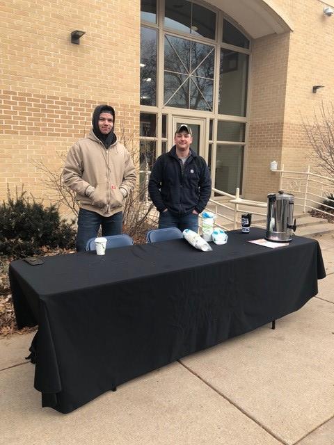 Students selling hot cider