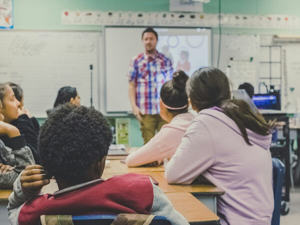 classroom with teachers and students