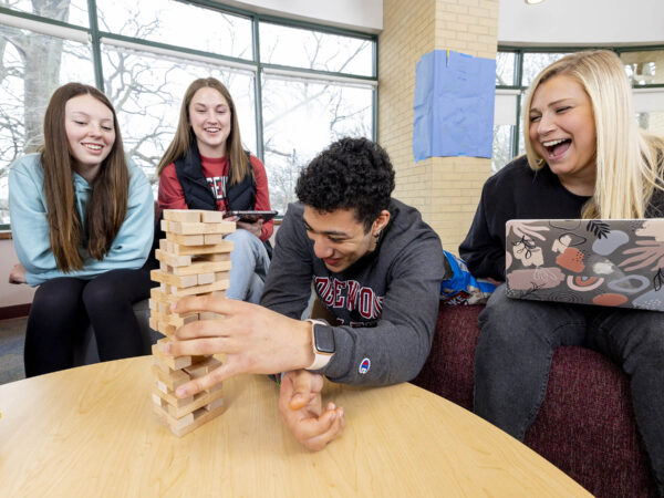 students playing jenga