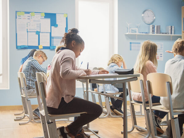 teacher speaking to students