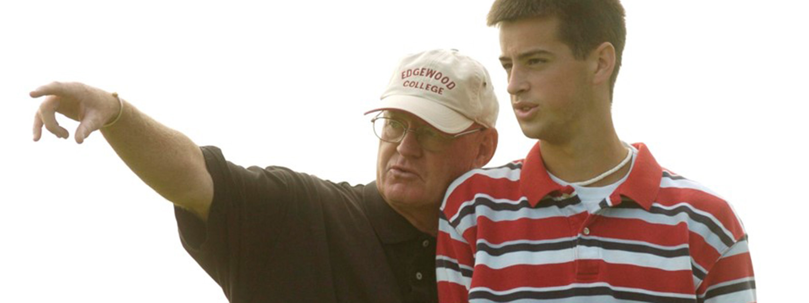 Oftedahl coaching a golfer player